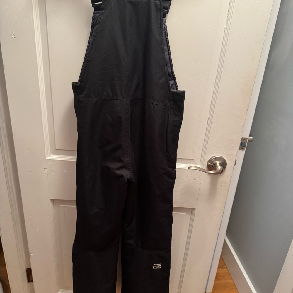 Arctix kids’ insulated snow bib overalls.  Kids size Medium (12)